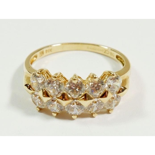 256 - A 14 carat gold dress ring set two rows of white stones, size N to O