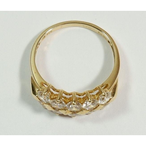 256 - A 14 carat gold dress ring set two rows of white stones, size N to O