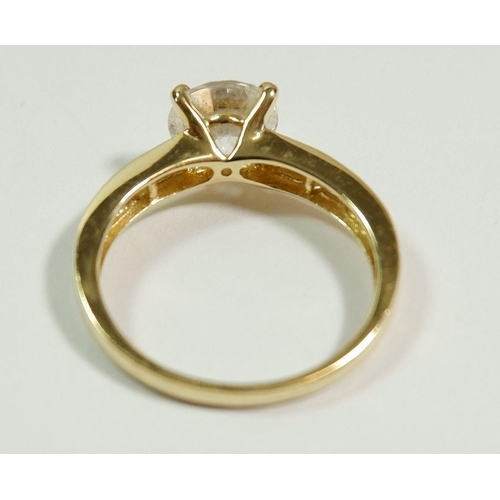 261 - A 14 carat gold dress ring set central white stone on baguette cut shoulders, size O to P