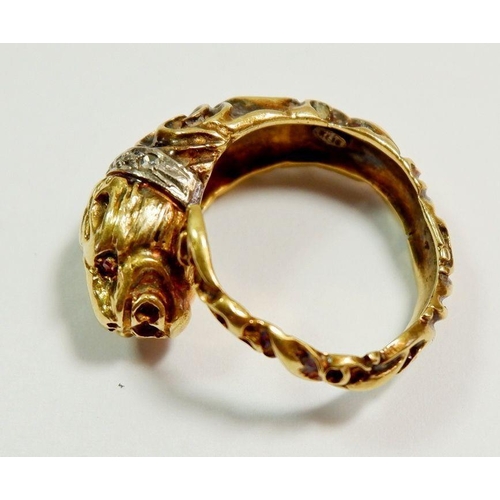 276 - An 18ct gold ring in the form of a leopards head and tail set diamond collar and ruby eyes, size K-L... 