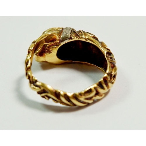 276 - An 18ct gold ring in the form of a leopards head and tail set diamond collar and ruby eyes, size K-L... 