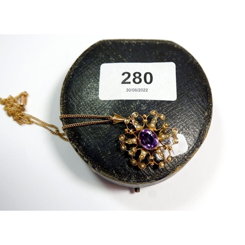 280 - An Edwardian 9 carat gold amethyst and seed pearl pendant/brooch on 9 carat gold chain in original b... 