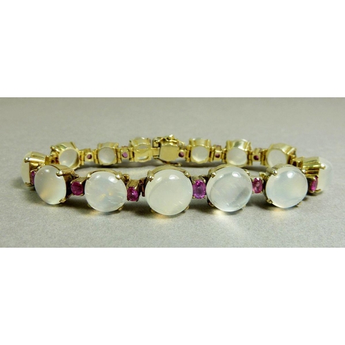 282 - A silver gilt moonstone and ruby link bracelet, 17.5cm