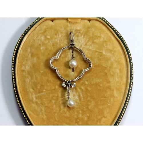 284 - An Edwardian diamond set pendant of open design suspended two pearls - with case, 4cm, 2.8g