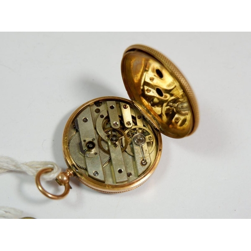 362 - A French 18 carat gold fob watch with engraved decoration and enamel dial, 3cm diameter, both cases ... 