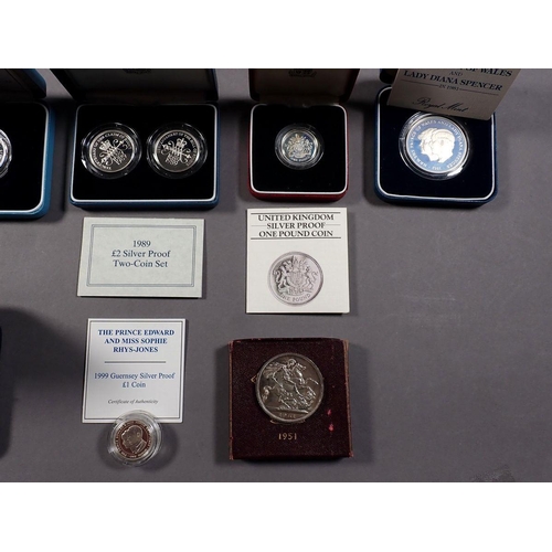 423 - A quantity of Royal Mint issues mainly silver content coinage in presentation cases with certificate... 