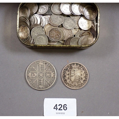 426 - A metal strong box with key containing quantity of silver content coinage: pre 1920 silver threepenc... 