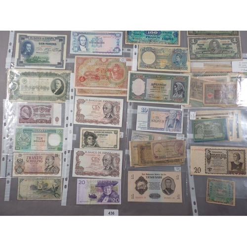 436 - A wad of world banknotes with examples countries including: Austria, Canada, France, Greece, Germany... 