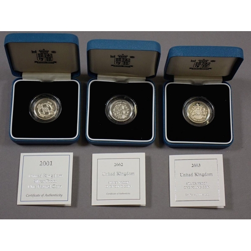 445 - Five Royal Mint issues in silver proof of £1 coins, presentation cases and certificates dates includ... 