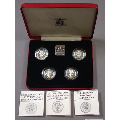 452 - Two Royal Mint issue sets of silver proof £1 coin in presentation cases with certificates (a) set 19... 