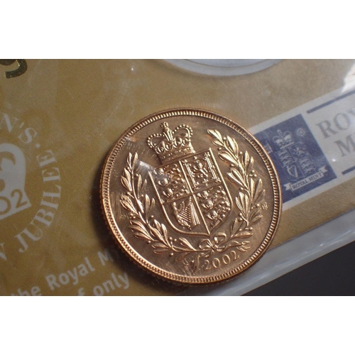 496 - A gold bullion sovereign 2002 Royal Mint issue in presentation card, Queens Golden Jubilee - Conditi... 