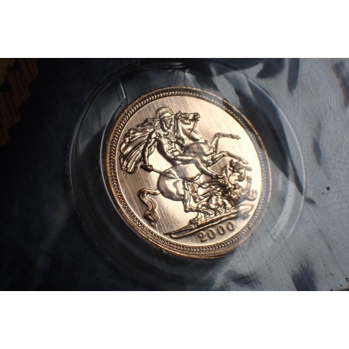 498 - A gold bullion half sovereign 2000, Royal Mint issue in presentation card - Condition: UNC