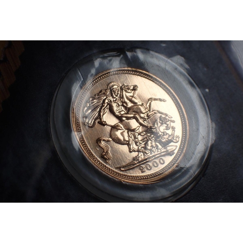 499 - A gold bullion half sovereign 2000, Royal Mint issue in presentation card - Condition: UNC