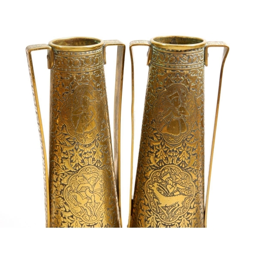 605 - A pair of brass candlesticks plus a pair of Kingo vases