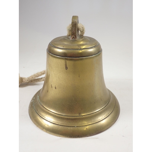 609 - A large brass ship's bell 20cm tall