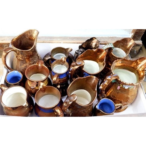 73 - A collection of Victorian copper lustre jugs etc.