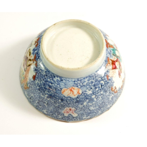 90 - A Chinese early 19th century bowl with figurative reserves on a blue and white floral ground, 14.5cm