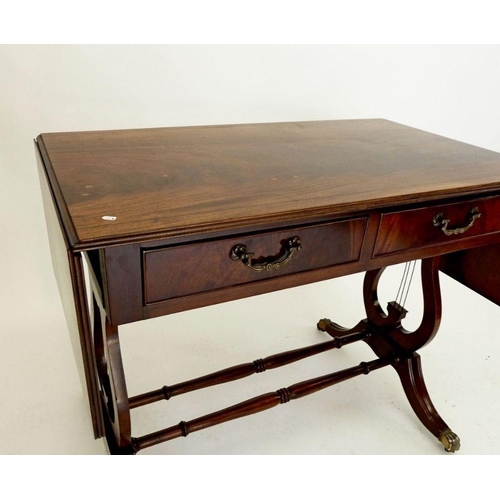 997 - A mid 20th century mahogany sofa table, 104 (centre top) x 66cm