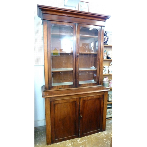 998 - A Victorian mahogany bookcase with pair of glazed doors over pair of panelled doors, 112cm wide (lac... 