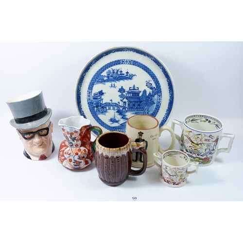 50 - A blue and white cake stand, two 'Speed the Plough' mugs, Kings Rifles tankard etc.