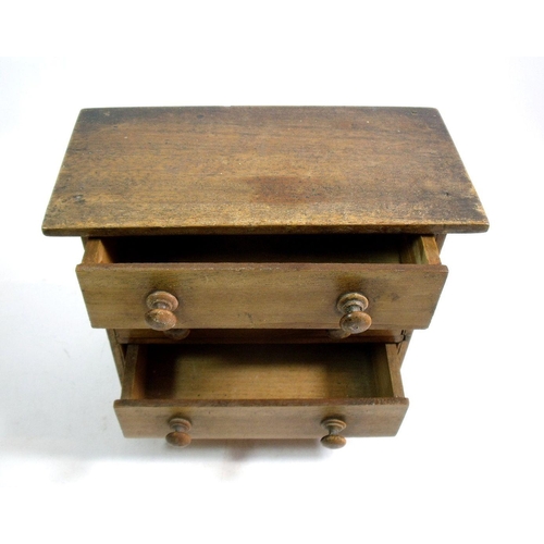 1003 - A Victorian mahogany miniature apprentice chest of three drawers, 22 x 20 x 11cm