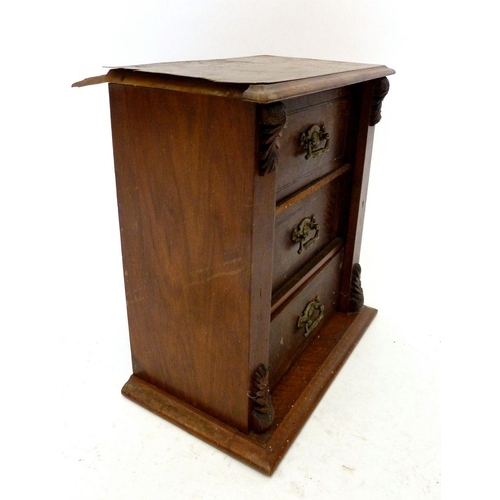 1004 - A Victorian walnut table top Wellington style cabinet of three drawers, 38cm tall and an elm box