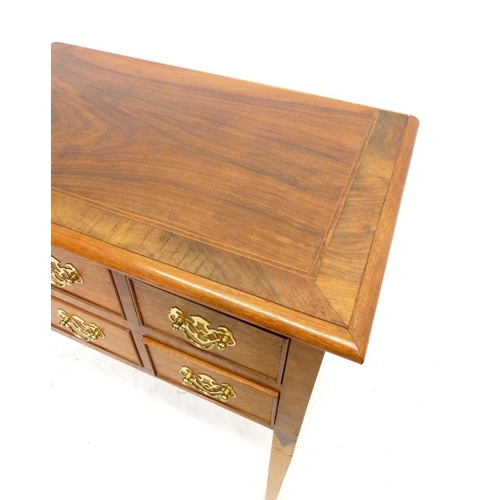 1085 - A small desk with six small drawers, 66cm wide