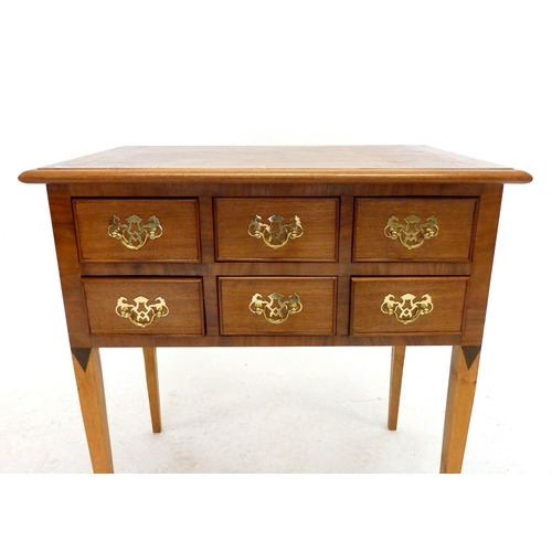 1085 - A small desk with six small drawers, 66cm wide