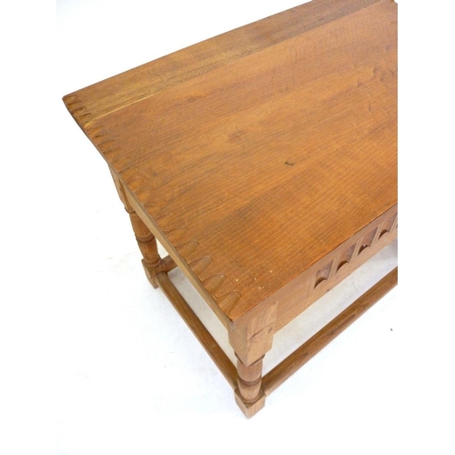 1098 - A light oak carved rise top occasional table, 58cm wide