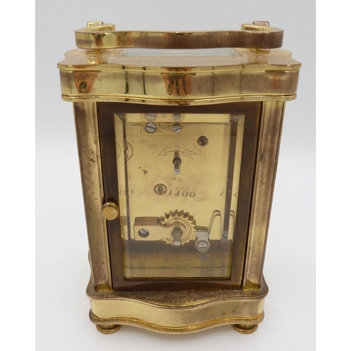 1100 - A French brass cased carriage clock, 12cm tall