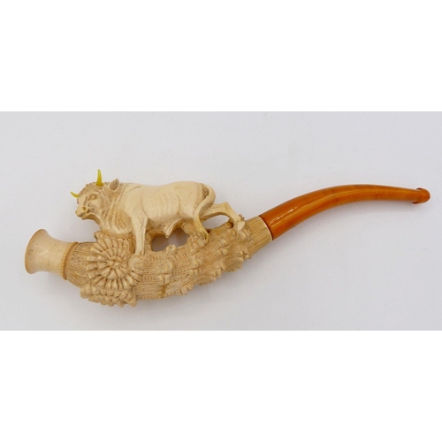 1106 - A 19th century meerchaum pipe in the form of a bull with amber mouthpiece and fitted case marked 'Ec... 