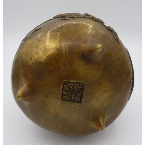 1116 - A Japanese brass incense burner with cast rat finial to lid and decoration to body raised on three s... 