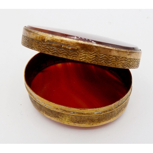 1121 - A gold plated oval agate set small box, 4cm wide