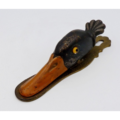 1122 - A Victorian painted brass duck head letter clip, 13 cm wide