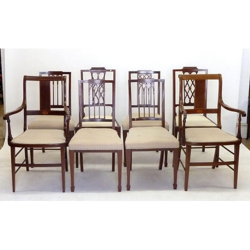 1129 - A set of six Edwardian mahogany lattice back dining chairs and a pair of Edwardian mahogany carver c... 