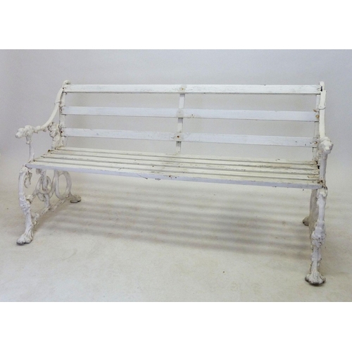 1136 - A Victorian Coalbrookdale style garden bench with dogs head arm rests and scrolling vines, 146cm wid... 