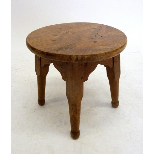 1143 - A light oak circular stool, 32cm tall