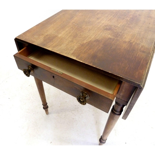 1187 - An early 19th century mahogany Pembroke table on turned supports