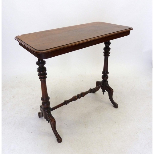 1192 - A Victorian mahogany stretcher table with turned supports, 89 x 44cm