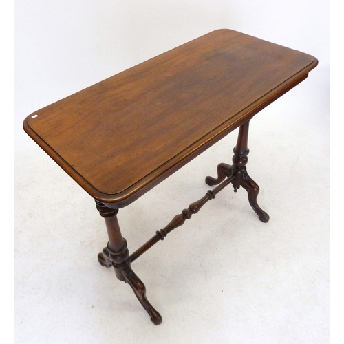 1192 - A Victorian mahogany stretcher table with turned supports, 89 x 44cm