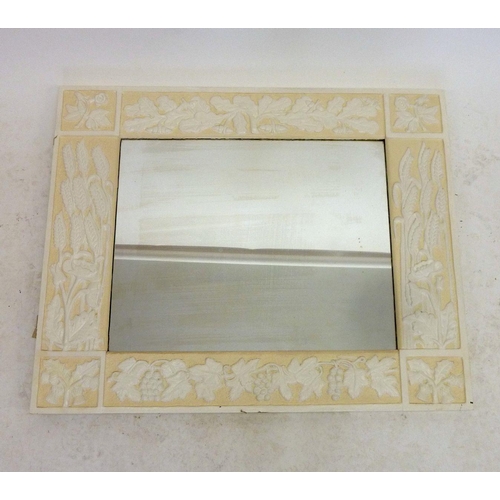 1194 - A large carved framed mirror with floral decoration, painted white, 92 x 75cm