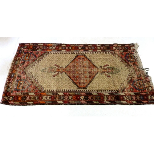 1196 - A tribal rug with cream ground and geometric motifs, a/f, 203 x 104 cm