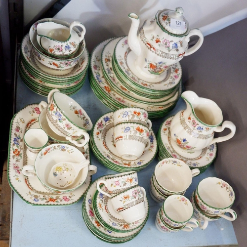 129 - A Copeland Spode 'Chinese Rose' part dinner service comprising: six dinner plates, four coffee cups ... 