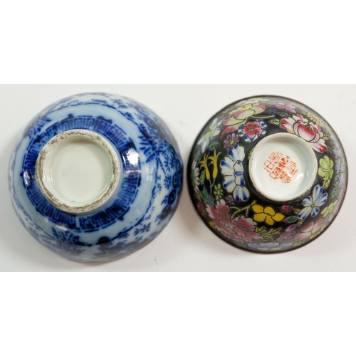 140 - A large Japanese blue and white charger 38cm diameter (repaired) and two oriental tea bowls