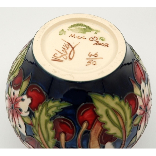 158 - A Moorcroft vase by Nicola Slaney, limited edition 46/50, 2002, 11cm decorated hibiscus and cherries