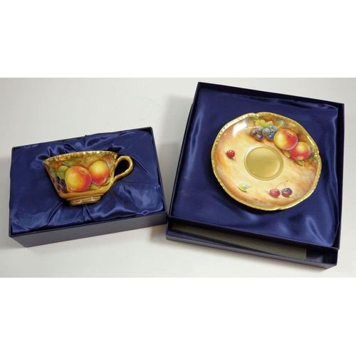 166 - A Royal Worcester cabinet cup and saucer painted by D M Fuller, boxed with certificate