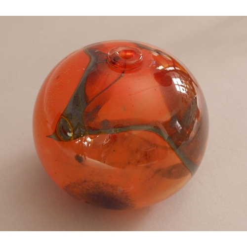 168 - A studio glass 'Red Sphere' by Pauline Solven, 1975, signed and dated, 12cm tall