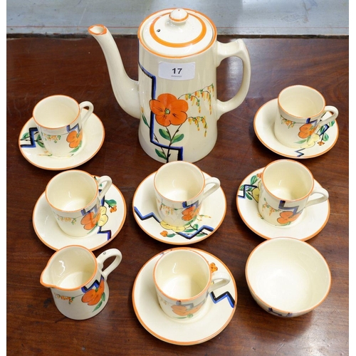 17 - A Wilkinson's Art Deco Honey Glaze coffee set decorated in the style of Clarice Cliff with orange fl... 