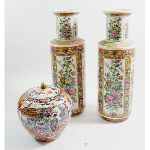 2 - Two Chinese vases decorated figures, 37 cm high, and a Hong Kong Imari jar with lid