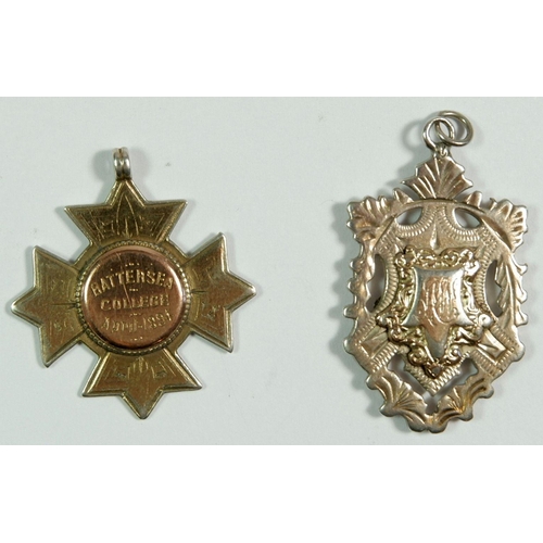 262 - A silver and 9ct gold sports fob 1895 by Vaughnon & Sons and a silver  one, 1913 by Robert Pringle &... 